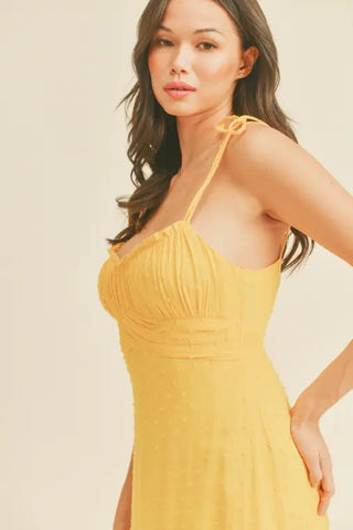 '-Swiss Dot Tie Strap Midi Dress -Draped bustline detail -Ruffle detail -Back zipper closure