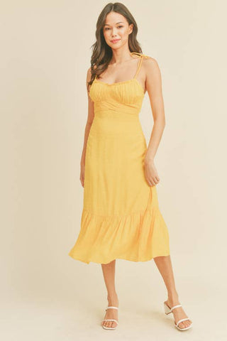 '-Swiss Dot Tie Strap Midi Dress -Draped bustline detail -Ruffle detail -Back zipper closure