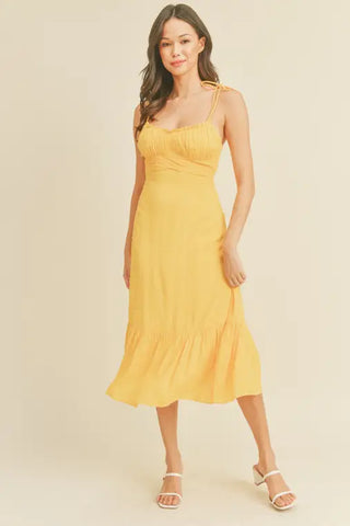 '-Swiss Dot Tie Strap Midi Dress -Draped bustline detail -Ruffle detail -Back zipper closure