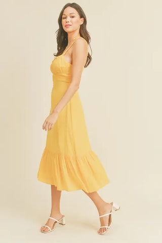 '-Swiss Dot Tie Strap Midi Dress -Draped bustline detail -Ruffle detail -Back zipper closure