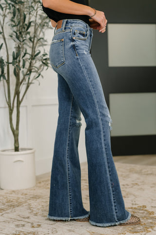 Marion Mid Rise Button Fly Flare with Destroy Fray Hem - West Avenue