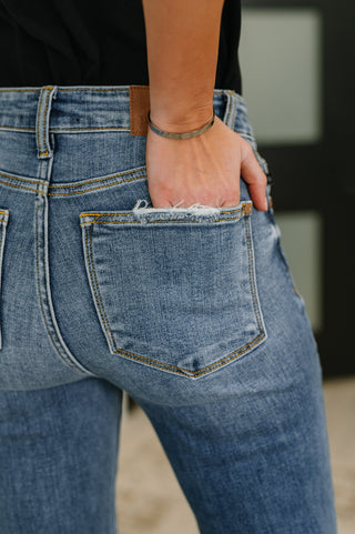 Marion Mid Rise Button Fly Flare with Destroy Fray Hem - West Avenue