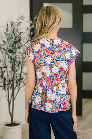 Mrs. Dependable Bow Detail Peplum Top - West Avenue