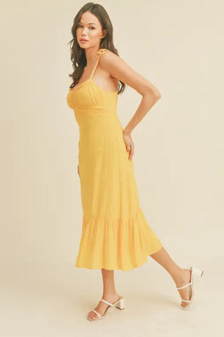 '-Swiss Dot Tie Strap Midi Dress -Draped bustline detail -Ruffle detail -Back zipper closure