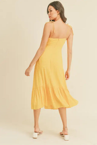 '-Swiss Dot Tie Strap Midi Dress -Draped bustline detail -Ruffle detail -Back zipper closure