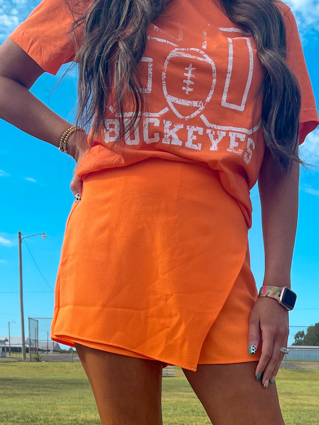 Orange Asymmetrical Hem Skirt