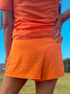Orange Asymmetrical Hem Skirt